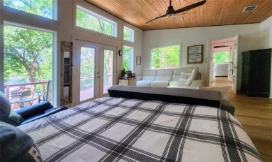 Wonderful modern style home in the piney woods of east Texas on Pine Dunes Golf Course in Texas - for sale on GolfHomes.com, golf home, golf lot
