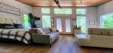 Wonderful modern style home in the piney woods of east Texas on Pine Dunes Golf Course in Texas - for sale on GolfHomes.com, golf home, golf lot
