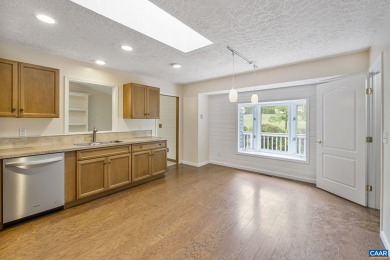 Welcome to this charming 3-bedroom, 2-bath home perfectly on Lake Monticello Golf Course in Virginia - for sale on GolfHomes.com, golf home, golf lot