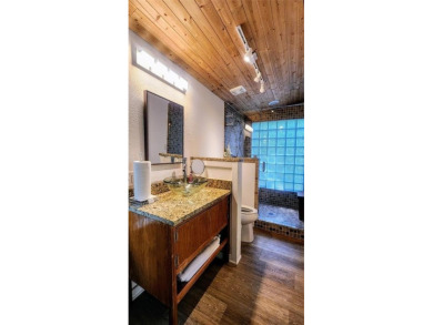 Wonderful modern style home in the piney woods of east Texas on Pine Dunes Golf Course in Texas - for sale on GolfHomes.com, golf home, golf lot
