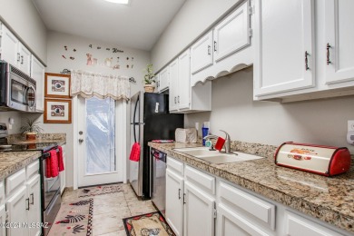 This charming 2-bedroom, 2-bathroom townhome is located in the on Desert Hills Golf Club of Green Valley in Arizona - for sale on GolfHomes.com, golf home, golf lot