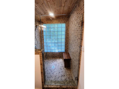 Wonderful modern style home in the piney woods of east Texas on Pine Dunes Golf Course in Texas - for sale on GolfHomes.com, golf home, golf lot