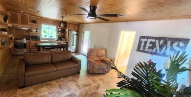 Wonderful modern style home in the piney woods of east Texas on Pine Dunes Golf Course in Texas - for sale on GolfHomes.com, golf home, golf lot