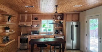Wonderful modern style home in the piney woods of east Texas on Pine Dunes Golf Course in Texas - for sale on GolfHomes.com, golf home, golf lot