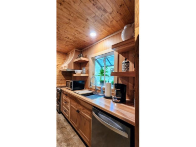Wonderful modern style home in the piney woods of east Texas on Pine Dunes Golf Course in Texas - for sale on GolfHomes.com, golf home, golf lot
