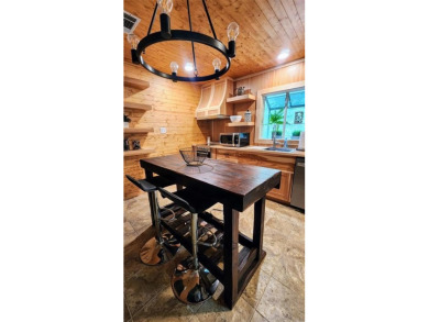 Wonderful modern style home in the piney woods of east Texas on Pine Dunes Golf Course in Texas - for sale on GolfHomes.com, golf home, golf lot