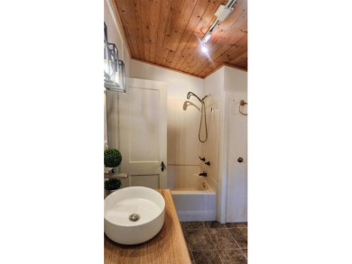 Wonderful modern style home in the piney woods of east Texas on Pine Dunes Golf Course in Texas - for sale on GolfHomes.com, golf home, golf lot