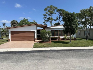 Enjoy resort-style living in this well-maintained 2-bedroom on Del Tura Golf and Country Club in Florida - for sale on GolfHomes.com, golf home, golf lot