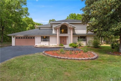 Welcome to this stunning 2-story pool home, offering 4 spacious on Citrus Springs Country Club in Florida - for sale on GolfHomes.com, golf home, golf lot