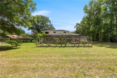 Welcome to this stunning 2-story pool home, offering 4 spacious on Citrus Springs Country Club in Florida - for sale on GolfHomes.com, golf home, golf lot