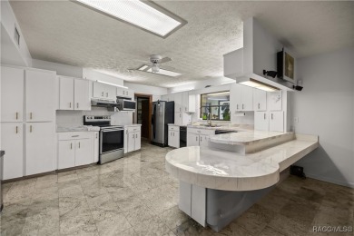 Welcome to this stunning 2-story pool home, offering 4 spacious on Citrus Springs Country Club in Florida - for sale on GolfHomes.com, golf home, golf lot