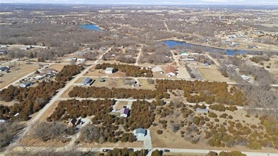 Discover easy, comfortable living in this brand-new 1 bedroom, 1 on Linn Valley Lakes - Deer Trace Golf Course in Kansas - for sale on GolfHomes.com, golf home, golf lot