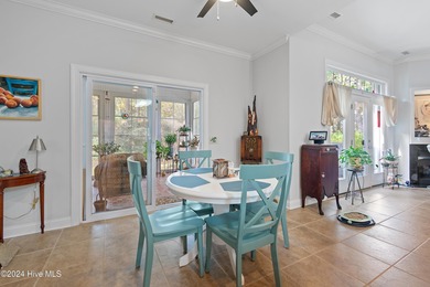 This beautiful home is nestled on a completely landscaped wooded on Lockwood Folly Country Club in North Carolina - for sale on GolfHomes.com, golf home, golf lot