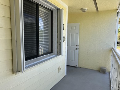 Golfers delight.... This upstairs 2 bedroom 2 bath condominium on Gator Trace Golf and Country Club in Florida - for sale on GolfHomes.com, golf home, golf lot