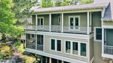 Located in The Arboretum in the coveted enclave of Caswell Beach on Oak Island Golf Club in North Carolina - for sale on GolfHomes.com, golf home, golf lot