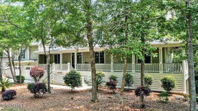 Located in The Arboretum in the coveted enclave of Caswell Beach on Oak Island Golf Club in North Carolina - for sale on GolfHomes.com, golf home, golf lot