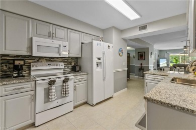 RARELY AVAILABLE UPGRADED 1ST FLOOR END UNIT WITH A DETACHED on Fountain Lakes Community Golf Course in Florida - for sale on GolfHomes.com, golf home, golf lot