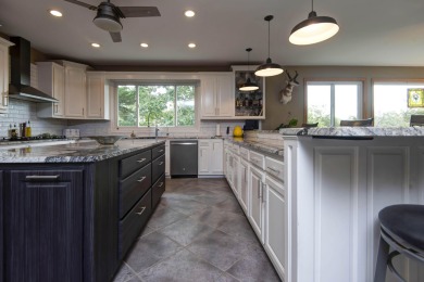 A Stunning Lakefront Retreat on the  Shores of Table Rock on Kimberling City Golf Club in Missouri - for sale on GolfHomes.com, golf home, golf lot