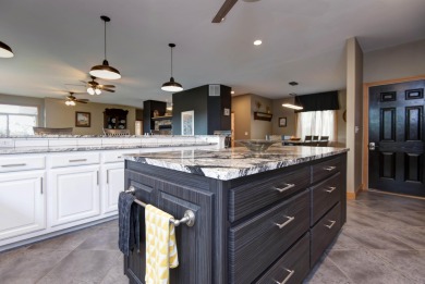 A Stunning Lakefront Retreat on the  Shores of Table Rock on Kimberling City Golf Club in Missouri - for sale on GolfHomes.com, golf home, golf lot