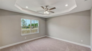 Modern Comfort Meets Exceptional Value in Groveland's Newest on Green Valley Country Club in Florida - for sale on GolfHomes.com, golf home, golf lot
