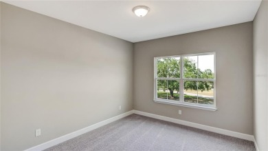 Modern Comfort Meets Exceptional Value in Groveland's Newest on Green Valley Country Club in Florida - for sale on GolfHomes.com, golf home, golf lot