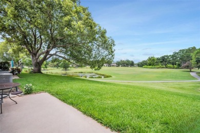Nestled in the highly sought-after Golf View Villas of Highland on Highland Lakes Executive Golf Course in Florida - for sale on GolfHomes.com, golf home, golf lot