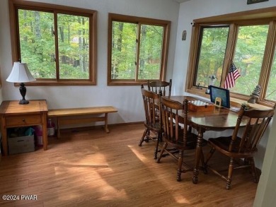 Time to cozy up....nestled in the trees find this 3 bedroom home on The Hideout Golf in Pennsylvania - for sale on GolfHomes.com, golf home, golf lot