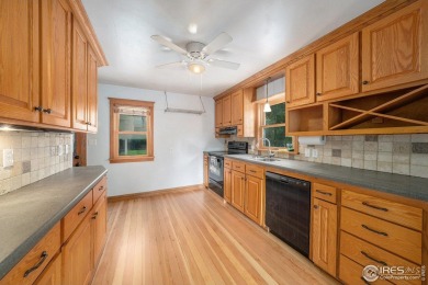 Don't miss this old town charmer, with 4 bedrooms and 2 bath on on Sunset Golf Course in Colorado - for sale on GolfHomes.com, golf home, golf lot
