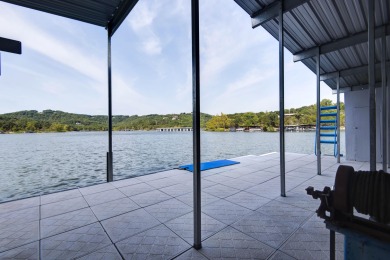 A Stunning Lakefront Retreat on the  Shores of Table Rock on Kimberling City Golf Club in Missouri - for sale on GolfHomes.com, golf home, golf lot