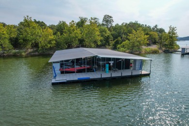 A Stunning Lakefront Retreat on the  Shores of Table Rock on Kimberling City Golf Club in Missouri - for sale on GolfHomes.com, golf home, golf lot