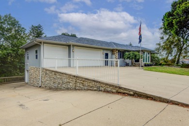 A Stunning Lakefront Retreat on the  Shores of Table Rock on Kimberling City Golf Club in Missouri - for sale on GolfHomes.com, golf home, golf lot