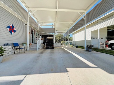 INTRODUCING this VERY unique, yet MODERN, hurricane RESISTANT on Lily Lake Golf and RV Resort in Florida - for sale on GolfHomes.com, golf home, golf lot