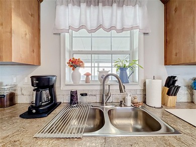 INTRODUCING this VERY unique, yet MODERN, hurricane RESISTANT on Lily Lake Golf and RV Resort in Florida - for sale on GolfHomes.com, golf home, golf lot