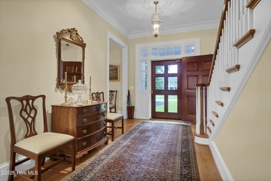 Gorgeous custom-built brick home on a 0.71 acre lot on fairway on Country Club of Landfall in North Carolina - for sale on GolfHomes.com, golf home, golf lot