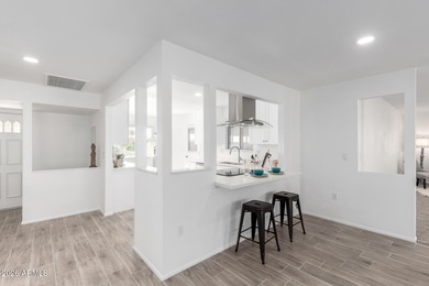 Coming soon- this beautifully remodeled home with an open floor on Sun City Lakes West and East in Arizona - for sale on GolfHomes.com, golf home, golf lot