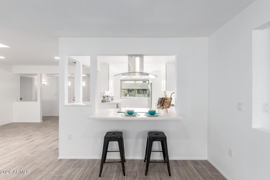 Coming soon- this beautifully remodeled home with an open floor on Sun City Lakes West and East in Arizona - for sale on GolfHomes.com, golf home, golf lot