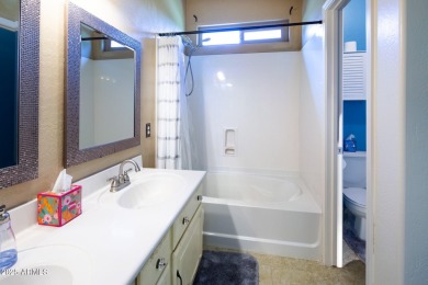 Step into a home that instantly wraps you in warmth. Morning on Seville Golf and Country Club in Arizona - for sale on GolfHomes.com, golf home, golf lot