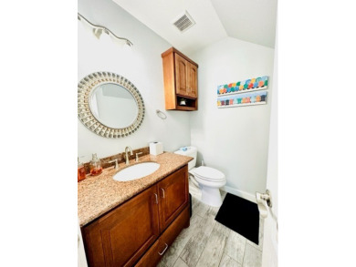 Waterfront Luxury with Private Boat Lift! Enjoy direct access to on South Padre Island Golf Club in Texas - for sale on GolfHomes.com, golf home, golf lot