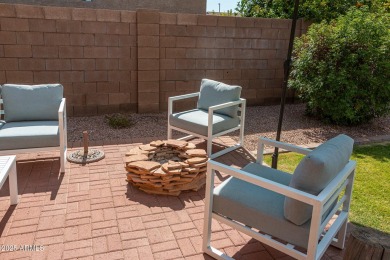 Step into a home that instantly wraps you in warmth. Morning on Seville Golf and Country Club in Arizona - for sale on GolfHomes.com, golf home, golf lot
