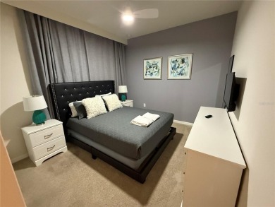 Professionally Designed, Fully Furnished 5-Bedroom Townhome in on Polo Park East in Florida - for sale on GolfHomes.com, golf home, golf lot