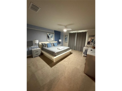 Professionally Designed, Fully Furnished 5-Bedroom Townhome in on Polo Park East in Florida - for sale on GolfHomes.com, golf home, golf lot