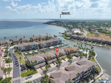 Waterfront Luxury with Private Boat Lift! Enjoy direct access to on South Padre Island Golf Club in Texas - for sale on GolfHomes.com, golf home, golf lot