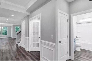 Stunning Craftsman Walk-out Basement Home with Golf Course Views on Woodside Plantation Country Club in South Carolina - for sale on GolfHomes.com, golf home, golf lot