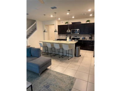 Professionally Designed, Fully Furnished 5-Bedroom Townhome in on Polo Park East in Florida - for sale on GolfHomes.com, golf home, golf lot