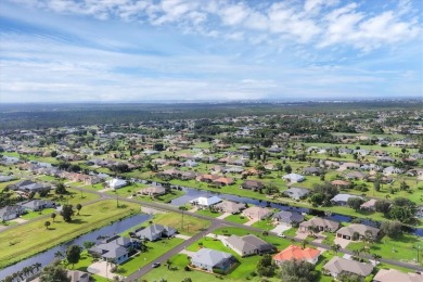 Sunny and Bright! This spacious White Marsh home has freshwater on Rotonda Golf and Country Club - Long Marsh  in Florida - for sale on GolfHomes.com, golf home, golf lot