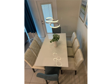 Professionally Designed, Fully Furnished 5-Bedroom Townhome in on Polo Park East in Florida - for sale on GolfHomes.com, golf home, golf lot