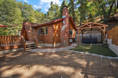 Charming mountain cabin in the heart of Moonridge, ideally on Big Bear Mountain Ski and Golf Resort in California - for sale on GolfHomes.com, golf home, golf lot