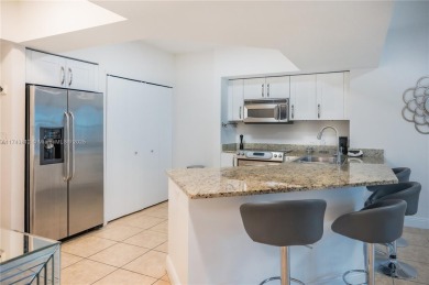 SPECTACULAR APARTMENT IN THE PRESTIGIOUS TURNBERRY VILLAGE.
 on Turnberry Isle Resort and Club in Florida - for sale on GolfHomes.com, golf home, golf lot
