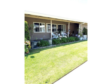This elegant 2 bedroom one bathroom home is located in a serene on Leisure World Seal Beach Golf Course in California - for sale on GolfHomes.com, golf home, golf lot