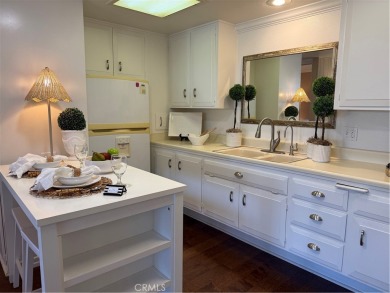 This elegant 2 bedroom one bathroom home is located in a serene on Leisure World Seal Beach Golf Course in California - for sale on GolfHomes.com, golf home, golf lot